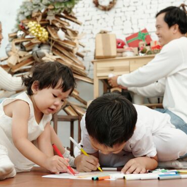 Children Drawing on the Floor