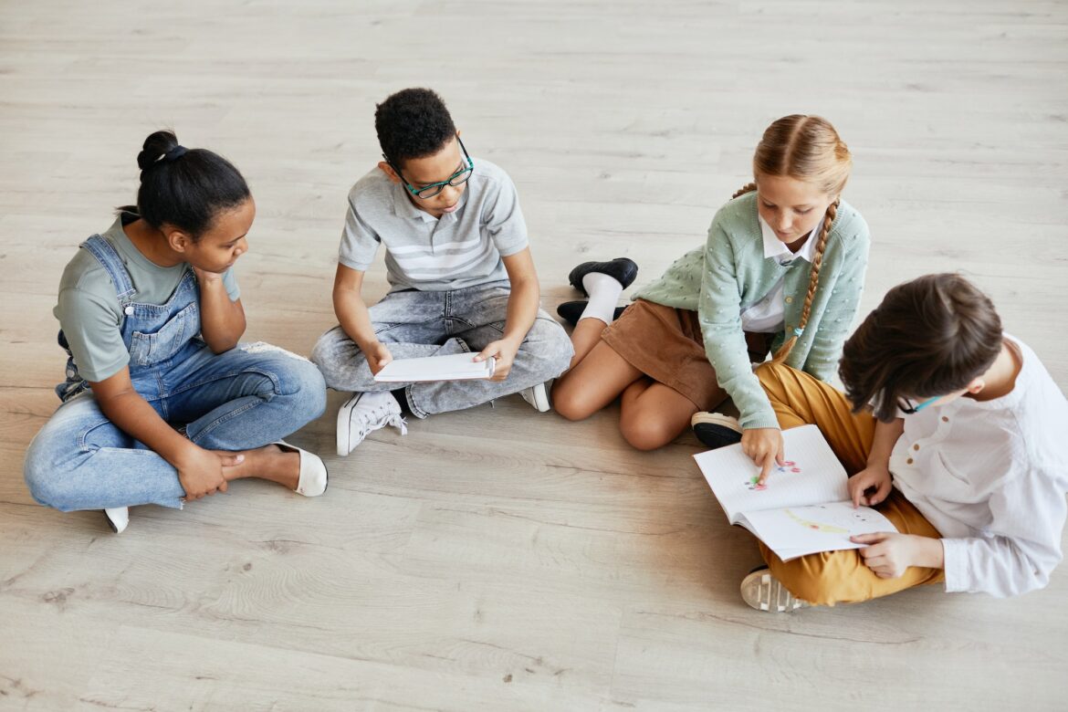 children-sitting-on-floor-in-art-gallery.jpg