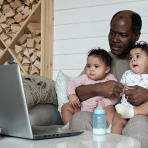 Father And Kids Watching Movie