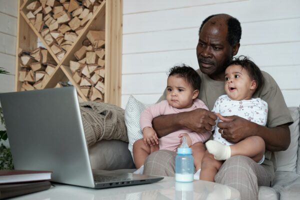 Father And Kids Watching Movie