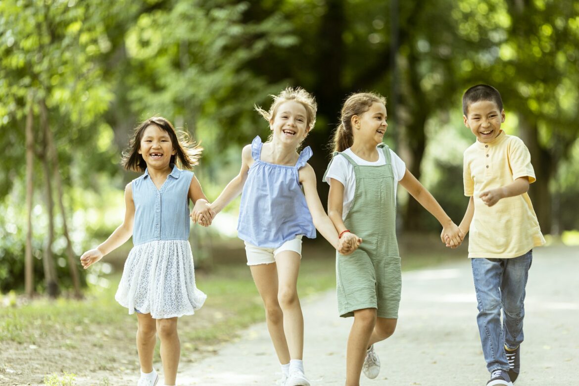 group-of-asian-and-caucasian-kids-having-fun-in-the-park.jpg