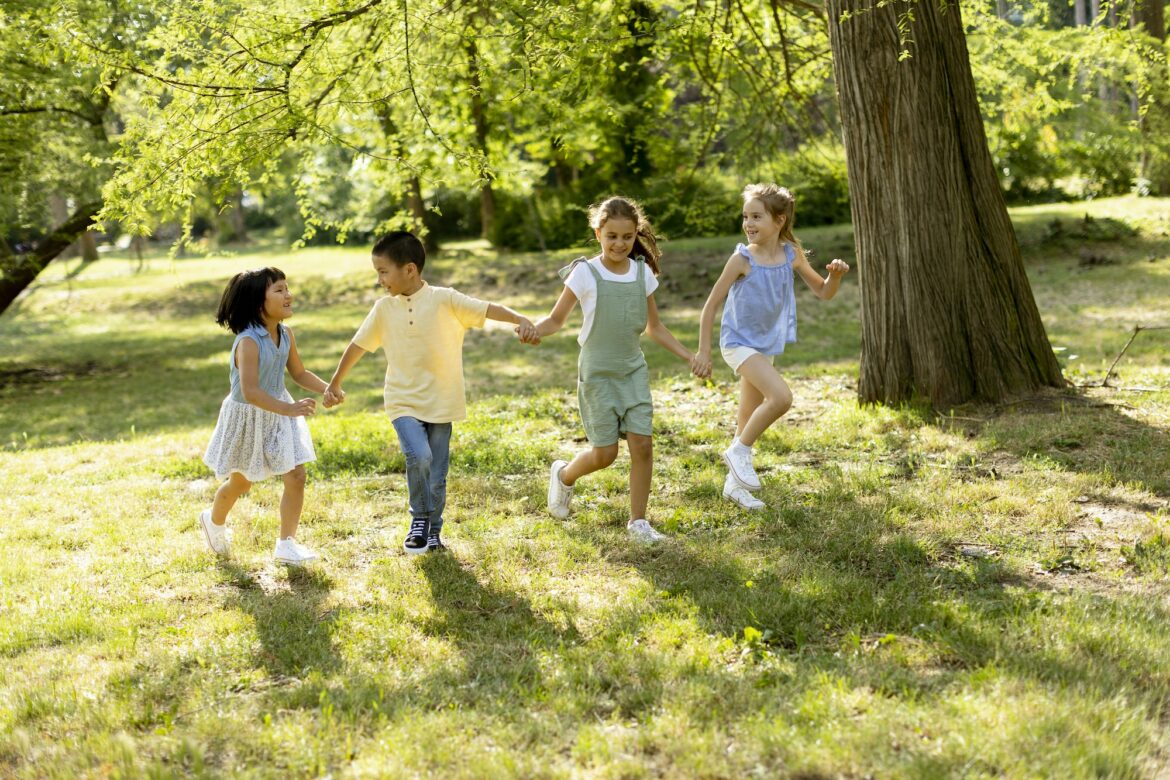 group-of-asian-and-caucasian-kids-having-fun-in-the-park-2.jpg