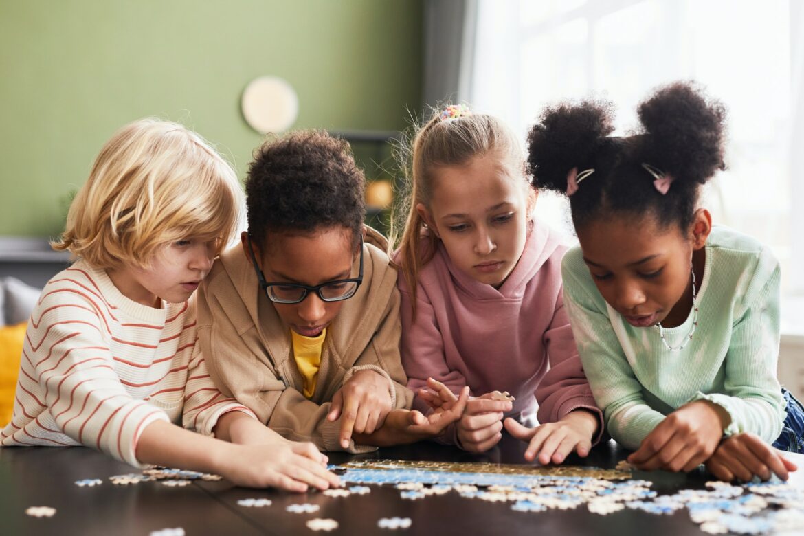 group-of-kids-playing-with-puzzle.jpg