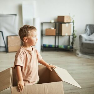 Kid Playing in Box