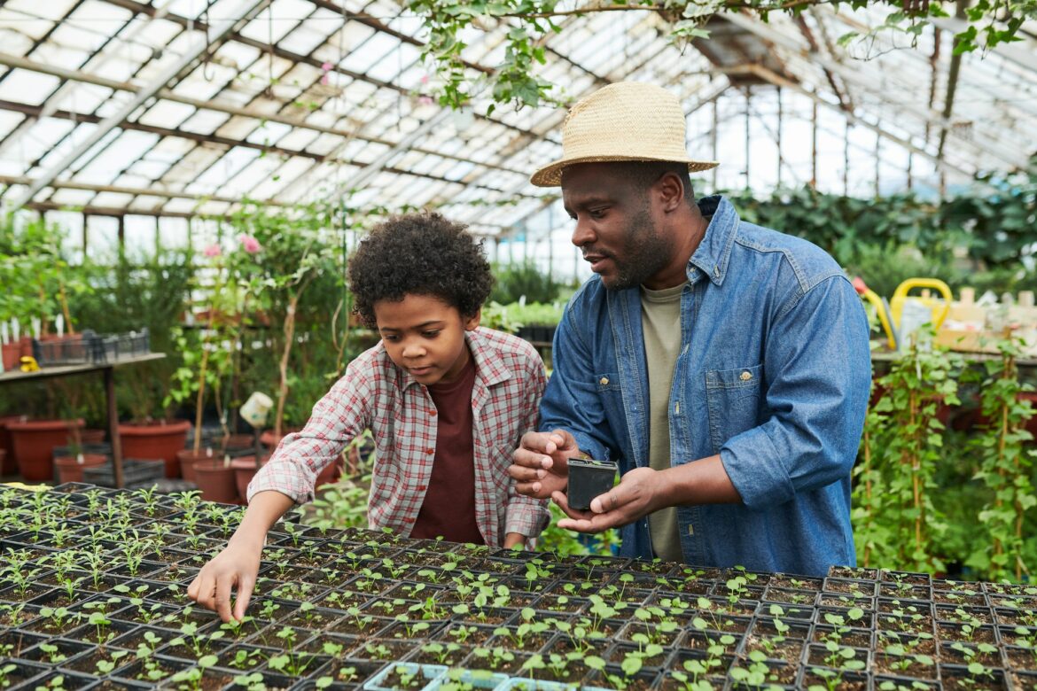 man-with-child-in-greenhouse.jpg