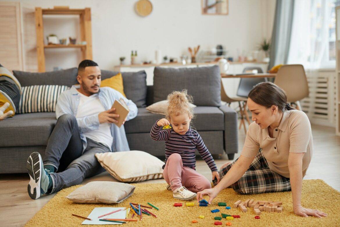 modern-family-playing-with-little-kid-at-home.jpg