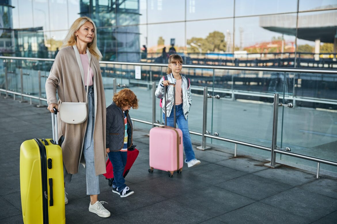 mother-going-to-the-airport-with-her-kids.jpg