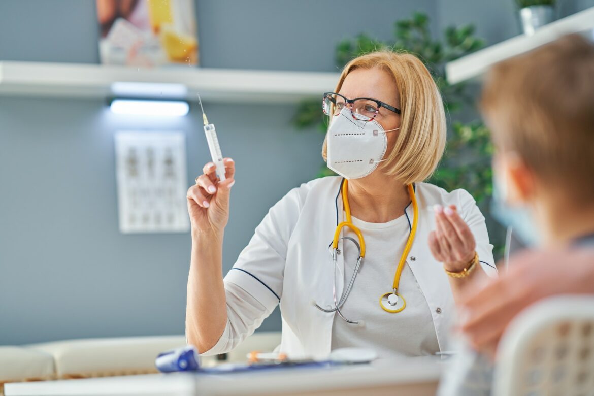 pediatrician-doctor-examining-little-kids-in-clinic-1.jpg