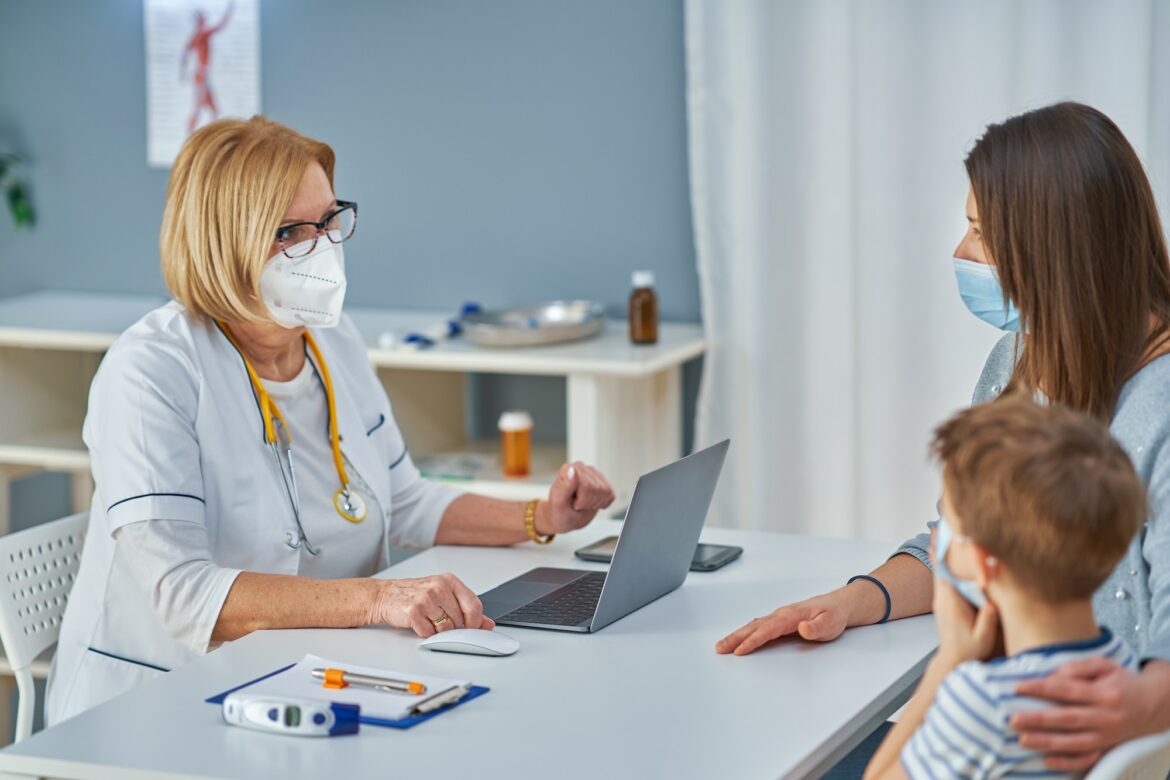 pediatrician-doctor-examining-little-kids-in-clinic.jpg