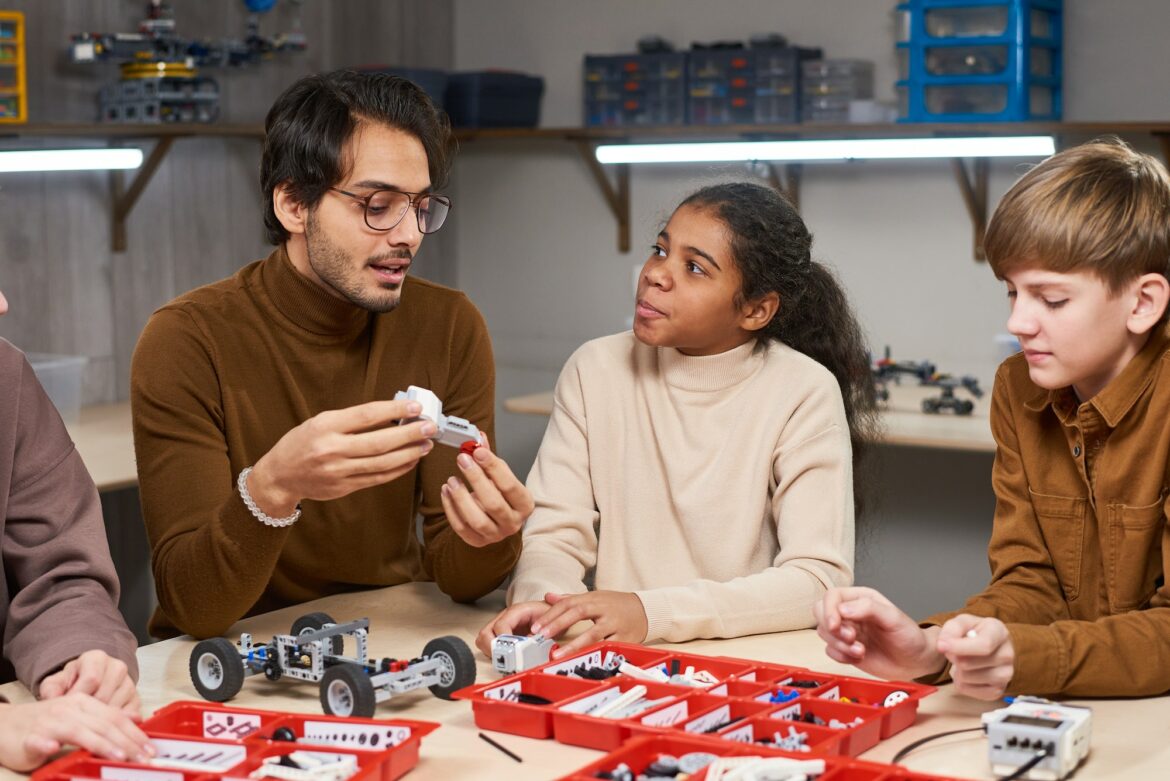 teacher-projecting-robots-with-children.jpg